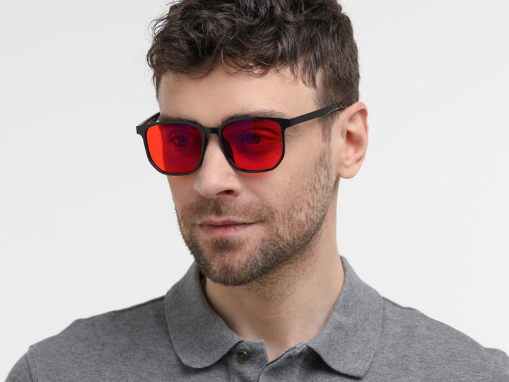 Dark blue light glasses worn in evening light